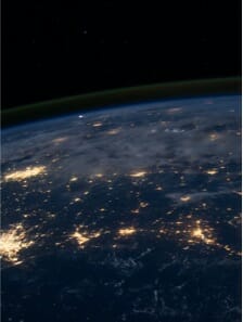 Satellite image of Earth across a broad landscape at night